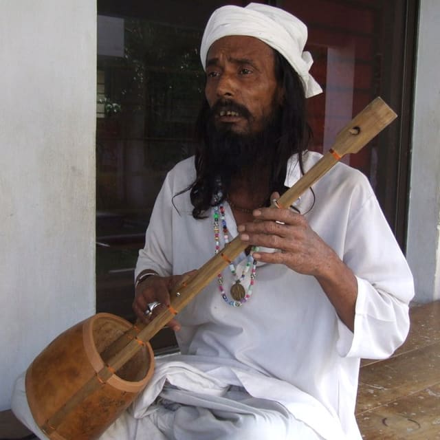 An ektara player at Lalon Shah's mazar, Kushtia. At Lalon Shah's tomb and mazar in Kushtia, Bangladesh.